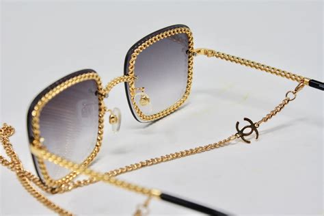 chanel chain sunglasses|chanel sunglasses with on side.